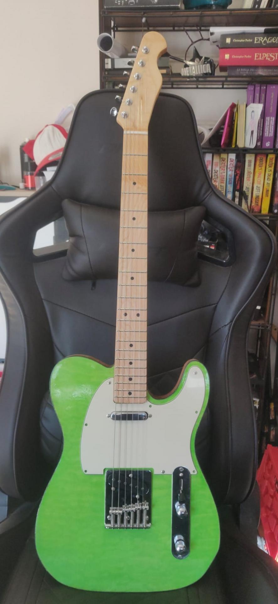 Finished alder TE style guitar kit with quilt maple veneer built by customer Daniel Alcocer